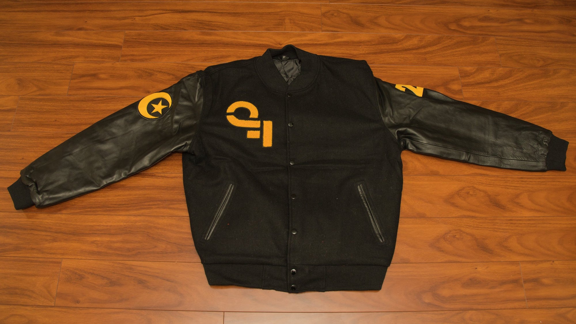 Qasr Fariyd Black Varsity Jacket Yellow Logo